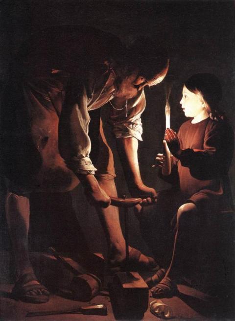 El Niño Jesús y San José representados como un carpintero y su hijo, que ayuda a su padre sosteniéndole una vela encendida