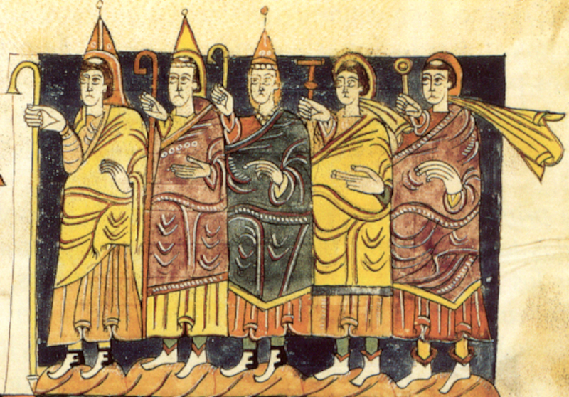 Un conjunto de cinco personajes con báculo, los cuales se distinguen tanto por el tocado de cada uno como por la forma del báculo