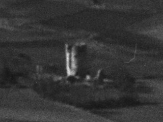 Vista muy ampliada de una perspectiva de Sigüenza tomada en 1962, donde se aprecia el torreón entero, pero con una poderosa grieta